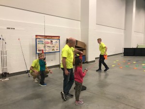 Learn 2 Fish With Us volunteers work with youth at the 2018 Fox Cities Kidz Expo on Saturday, April 14, 2018